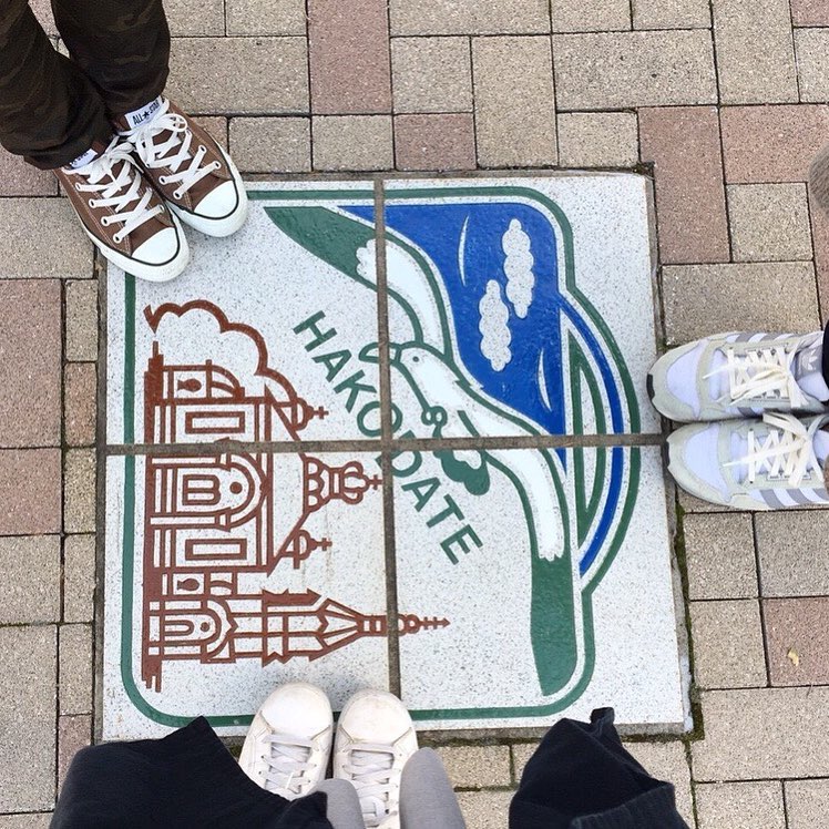 Hakodate road sign and sneakers