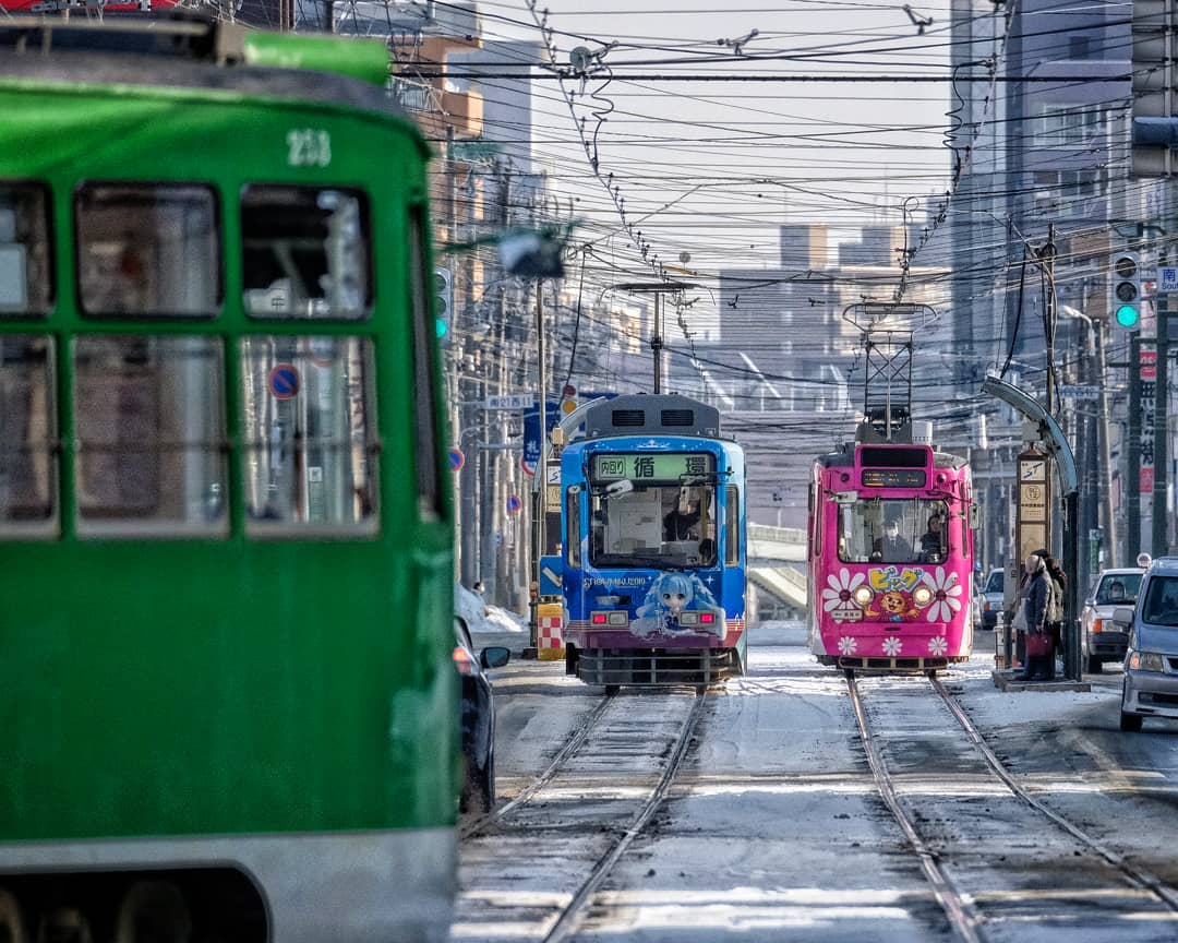 Three trams running in Sapporo